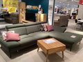 Grünes Ecksofa